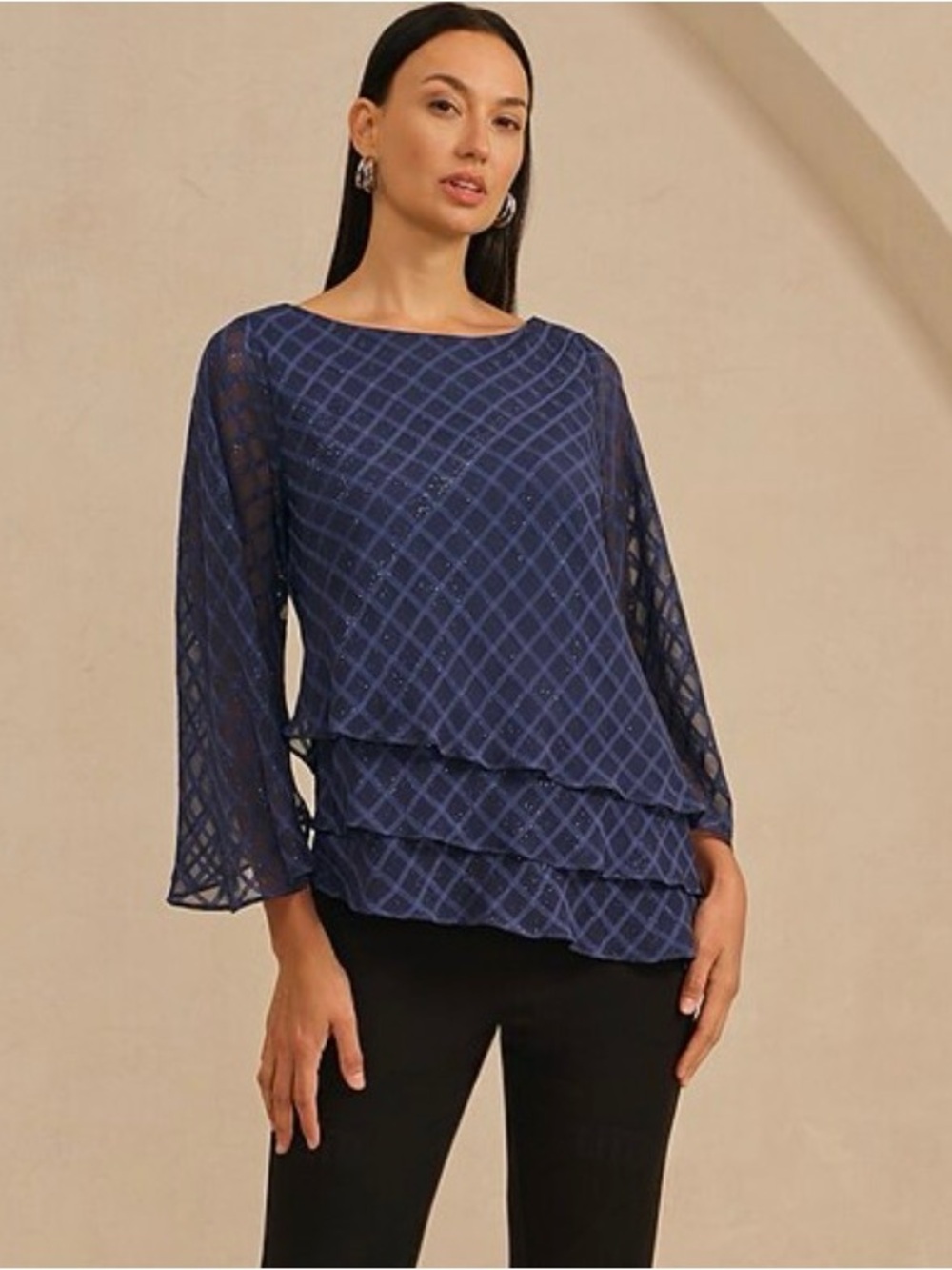 Adore Brand.  FITS LIKE A LARGE. Tag reads small.